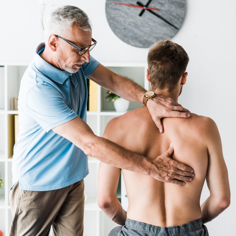 Chiropractic for Headaches and Migraines Camrose 6 Sciatica and Back Pain Relief Camrose physiotherapist providing spinal assessment and manual therapy
