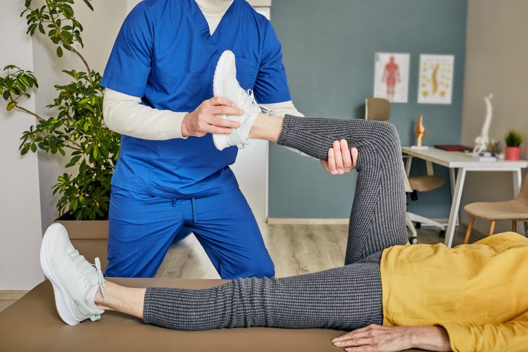 Camrose Physiotherapy assessment with a physiotherapist evaluating a patient's posture, movement, and mobility